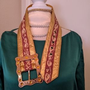 Gold ornate buckle belt size xs